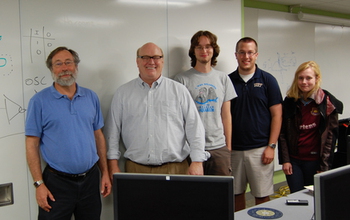 Photo of researchers on the Visual Cortex on Silicon team with three students.